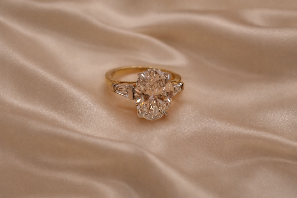 Timeless Elegance: 4.02ct Oval & Tapered Baguette Bridal Set