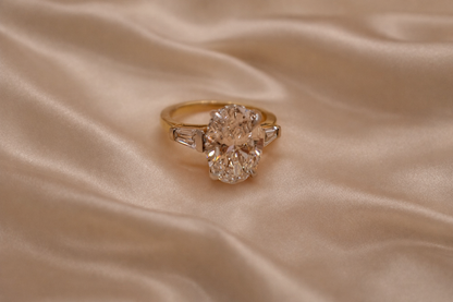 Timeless Elegance: 4.02ct Oval & Tapered Baguette Bridal Set