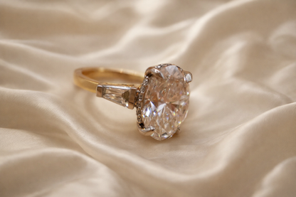 Timeless Elegance: 4.02ct Oval & Tapered Baguette Bridal Set