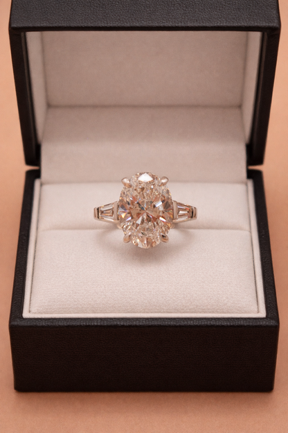 Timeless Elegance: 4.02ct Oval & Tapered Baguette Bridal Set
