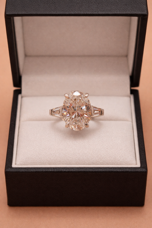 Timeless Elegance: 4.02ct Oval & Tapered Baguette Bridal Set